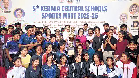 Thrissur team with the championship trophy after winning the fifth Kerala Central School Sports Meet held at Maharaja’s College ground