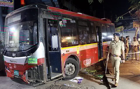 Police personnel at the site after a Brihanmumbai Electric Supply and Transport (BEST) bus accident, wherein encroachment of the sidewalk by hawkers forced pedestrians to step onto the road, leading to the death of four people, near Bhandup railway station in Mumbai, Monday night, Dec. 29, 2025.