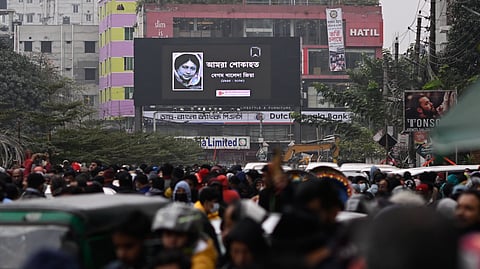 A portrait of former Bangladeshi Prime Minister Khaleda Zia is displayed on a digital screen near the hospital where she died, in Dhaka, Bangladesh, Tuesday, Dec. 30, 2025.