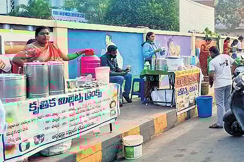 Residents are seen queued up drinking nutrition/millet based juices at Vijayawada.