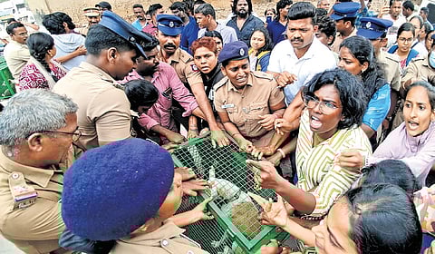 Activists arguing with police and corporation staff on HC premises.