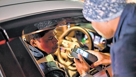 Police conducting breathalyser test in Jaydev Vihar in Bhubaneswar on Wednesday night