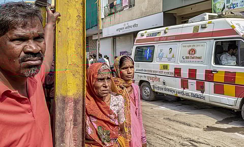 Residents wait to recieve medical help at Bhagirathpura amid the contaminated tap water crisis where several people died and fell ill.