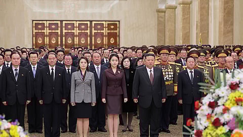 North Korea's leader Kim Jong Un, centre right; his wife, Ri Sol Ju, third left; and their daughter, centre, believed to be named Kim Ju Ae, visit Kumsusan Palace of the Sun in Pyongyang, North Korea, Thursday, Jan. 1, 2026.