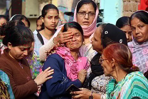 Families of victims mourn as at least 10 people, including a child, lost their lives