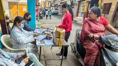 Medicines being distributed at a camp after several people were affected due to consumption of contaminated water at Bhagirathpura area, in Indore, Madhya Pradesh, Wednesday, Dec. 31, 2025
