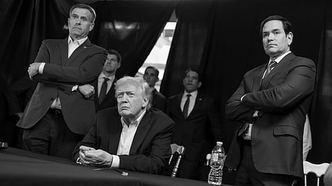 In this photo released by the White House, US President Donald Trump monitors American military operations in Venezuela with CIA Director John Ratcliffe (L) and Secretary of State Marco Rubio (R) at Mar-a-Lago in Palm Beach, Fla., Saturday, Jan. 3, 2026.