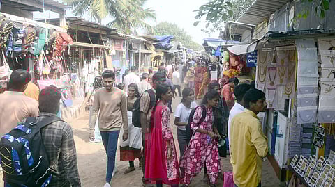 Madras High Court order directing the reduction of shops along Marina Beach.