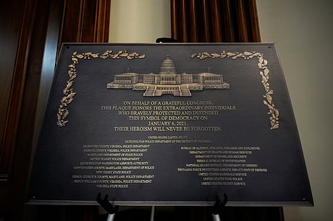 A replica plaque commemorating the Jan. 6, 2021 Capitol riot stands outside the office of House Minority Leader Hakeem Jeffries, D-N.Y, Tuesday, Dec. 30, 2025, at the U.S. Capitol in Washington.