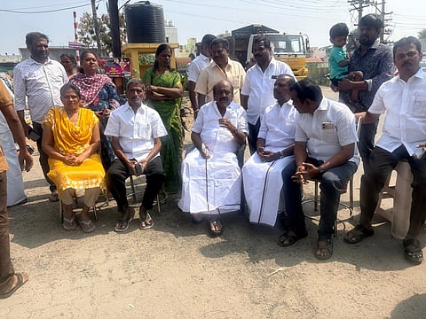 Tiruppur South MLA K Selvaraj staged a sit-in protest on Monday against the Corporation administration over the garbage issue.