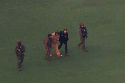 This image taken from video shows Venezuelan President Nicolas Maduro being escorted to board a helicopter for transport to Manhattan Federal Court, Monday, Jan. 5, 2026, in New York.