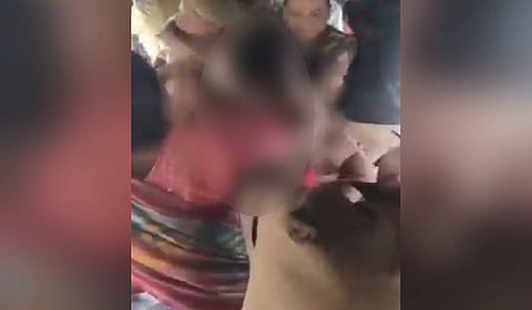Videograb shpwing the woman being assaulted