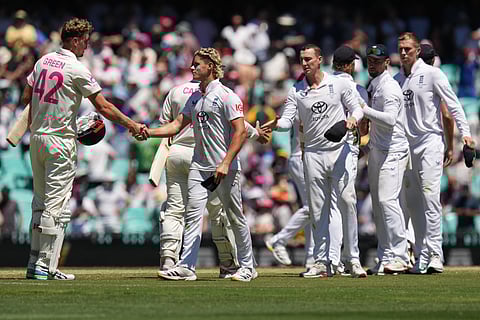 Australia's Cameron Green, left, is congratulated by England's Jacob Bethell following the fifth and final Ashes cricket test between England and Australia in Sydney, Thursday, Jan. 8, 2026.