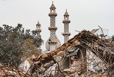 A damaged structure after the demolition of alleged encroachments on a land adjoining the Syed Faiz Elahi Mosque and a nearby graveyard, carried out by the Municipal Corporation of Delhi (MCD), in New Delhi, Wednesday, Jan. 7, 2025. At least five police personnel were injured after the drive near a mosque turned violent.
