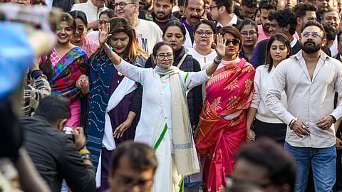 West Bengal Chief Minister Mamata Banerjee leads a protest march accompanied by party leaders including June Maliah and others against the Enforcement Directorate's searches linked to political consultancy firm I-PAC, in Kolkata, Friday, Jan. 9, 2026