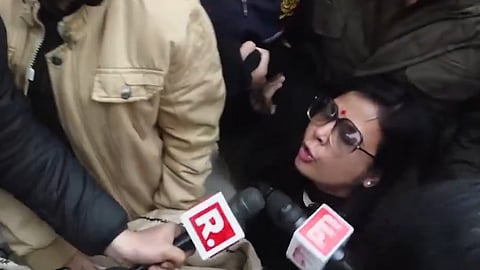 Police detain TMC MP Mahua Moitra as party MPs protest outside Union Home Minister Amit Shah's office against ED raids on the I-PAC office in Kolkata.