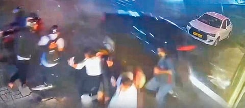 A screengrab of the car jumping the median and hitting the restaurant wall on 100ft Road in Indiranagar on Friday night.