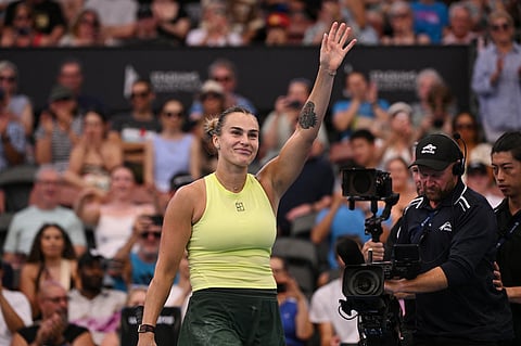 Aryna Sabalenka of Belarus celebrates winning her women's semi-final singles match against Karolina Muchova of the Czech Republic at the Brisbane International tennis tournament in Brisbane on January 10, 2026.