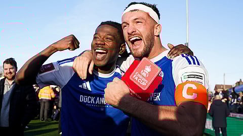 Macclesfield FC goalscorers Paul Dawson, right and Isaac Buckley-Ricketts celebrate following the FA Cup third round soccer match between Macclesfield Town and Crystal Palace, at the Leasing.com Stadium, Macclesfield, England, Saturday, Jan. 10, 2026.
