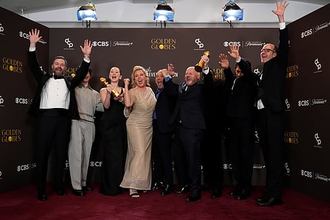 Philip Barantini, from left, Owen Cooper, Erin Doherty, Hannah Walters, Stephen Graham, Andy Cooper, Ashley Walters, Jeremy Kleiner, and Jack Thorne pose during the 83rd Golden Globes on Sunday at the Beverly Hilton in Beverly Hills, Calif.