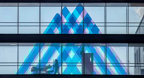 A medical worker transports a patient at Mount Sinai Hospital, April 1, 2020, in New York.