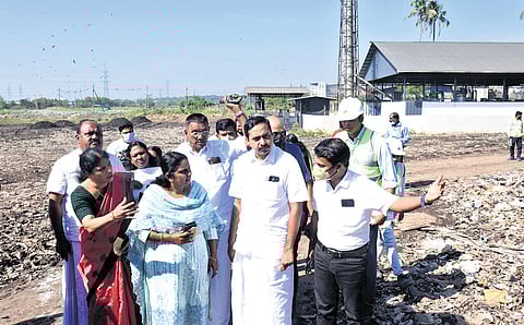 Mayor V K Minimol and standing committee chairpersons visit the Brahmapuram waste dumping yard where plastic waste is being collected.