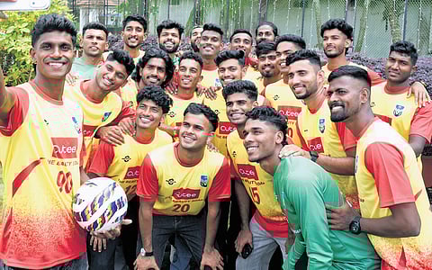 Captain Sanju G takes a selfie with his teammates.