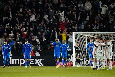 Real Madrid players react after Albacete scored its second goal during the Copa del Rey round of 16 soccer match between Albacete and Real Madrid, in Albacete, Spain, Wednesday, Jan. 14, 2026.