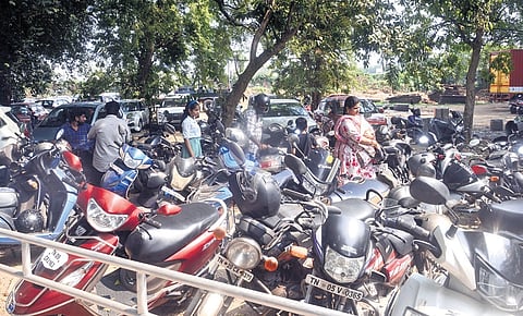 The Chennai Book Fair in Nandanam has poor toilet facilities, inadequate parking spots, and wheelchair shortage.
