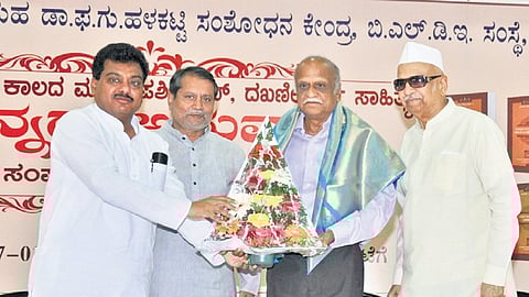 Dr MM Kalburgi being honoured by BLDE Chairman MB Patil.
