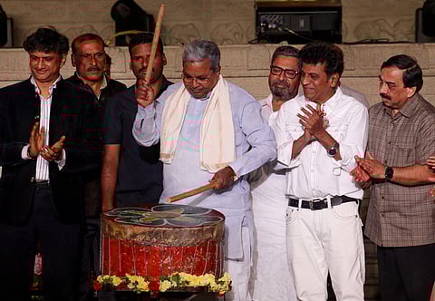 CM Siddaramaiah plays the traditional drum, inaugurating Bengaluru Habba 2026 at Vidhana Soudha on Friday.
