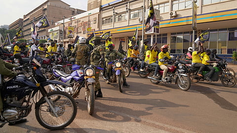 Uganda's security forces patrol a street as supporters of Ugandan President Yoweri Museveni celebrate his victory in the presidential election in Kampala, Uganda, Saturday, Jan. 17, 2026.