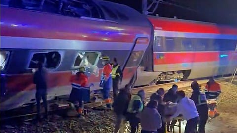 This video grab taken from UGC images posted on social media and verified by AFPTV teams in Madrid, shows emergency personnel working after a train accident in Adamuz, southern Spain, on January 18, 2026.
