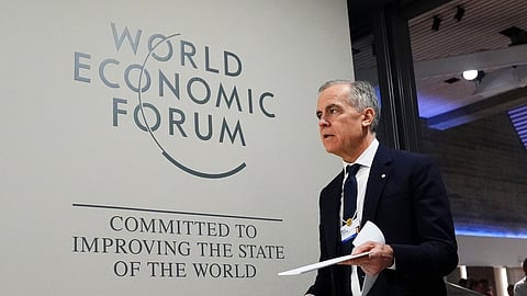 Canada Prime Minister Mark Carney makes his way to take part in an event titled "Country Strategy Dialogue: Canada" as he attends the World Economic Forum in Davos, Switzerland, on Tuesday, Jan. 20, 2026.