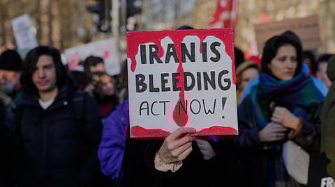 Protesters participate in a demonstration in support of the nationwide mass protests in Iran against the government, in Berlin.