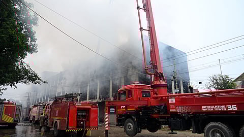 Firefighters try to douse a fire after it broke out, at Bakawala area in New Delhi on Sunday, Sept. 8, 2024.