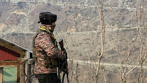 A security officer during a search operation to track down and neutralise terrorists, in Kishtwar district, Jammu and Kashmir.