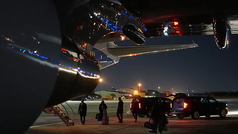 Things are unloaded from Air Force One after the plane, carrying President Donald Trump to the World Economic Form in Davos, experienced a minor electrical issue after departure, Tuesday, Jan. 20, 2026, and returned to Joint Base Andrews, Md. Trump will board a second plane to complete the trip.