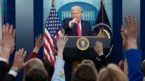 President Donald Trump calls on reporter to ask a question during a press briefing at the White House in Washington, Tuesday, Jan. 20, 2026.