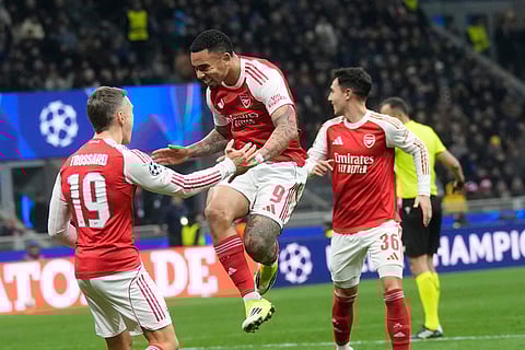 Arsenal's Gabriel Jesus, centre, celebrates with his teammates after scoring his side's second goal during the Champions League opening phase soccer match between Inter Milan and Arsenal in Milan, Italy, Tuesday, Jan. 20, 2026.