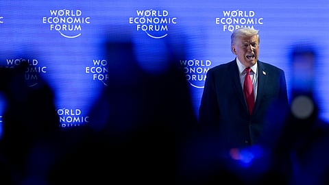 US President Donald Trump walks onto the stage during the 56th annual meeting of the World Economic Forum (WEF) in Davos, Switzerland, Wednesday, Jan. 21, 2026.