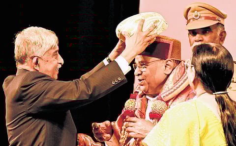 Governor Thaawarchand Gehlot being felicitated by former Rajya Sabha member K C Ramamurthy at a programme in Bengaluru on Wednesday