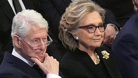 Former US President Bill Clinton and former Secretary of State Hillary Clinton listen during the state funeral for former President Jimmy Carter at Washington National Cathedral in Washington, Jan. 9, 2025.