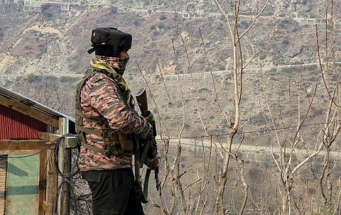 A security officer during a search operation to track down and neutralise terrorists, in Kishtwar district, Jammu and Kashmir.