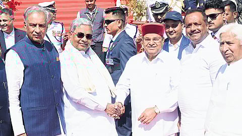 CM Siddaramaiah welcomes Governor Thaawarchand Gehlot on the steps of Vidhana Soudha on Thursday.