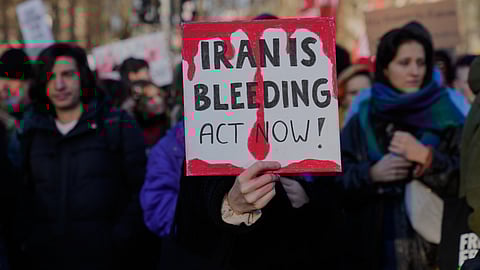 Protesters participate in a demonstration in support of the nationwide mass protests in Iran against the government.