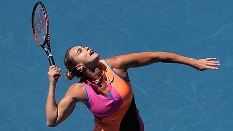 Aryna Sabalenka of Belarus serves to Anastasia Potapova of Austria during their third round match at the Australian Open tennis championship in Melbourne, Australia, Friday, Jan. 23, 2026.