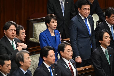 Japan's Prime Minister Sanae Takaichi (C) attends the House of Representatives plenary session at the Diet in Tokyo on January 23, 2026.