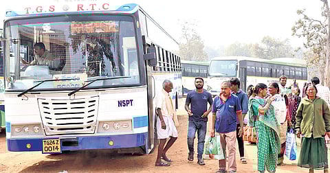 Pilgrims get off a TGSRTC bus at Medaram on Friday. The TGSRTC has made
extensive transport arrangements to ferry people to Asia’s biggest fair