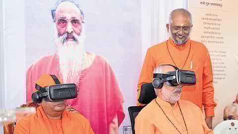 Participants explore virtual reality (VR) Chinmaya visuals during the inauguration of Chinmaya Missions 75th anniversary Hyderabad celebrations, Amrit Mahotsav, at NTR Stadium Hyderabad.